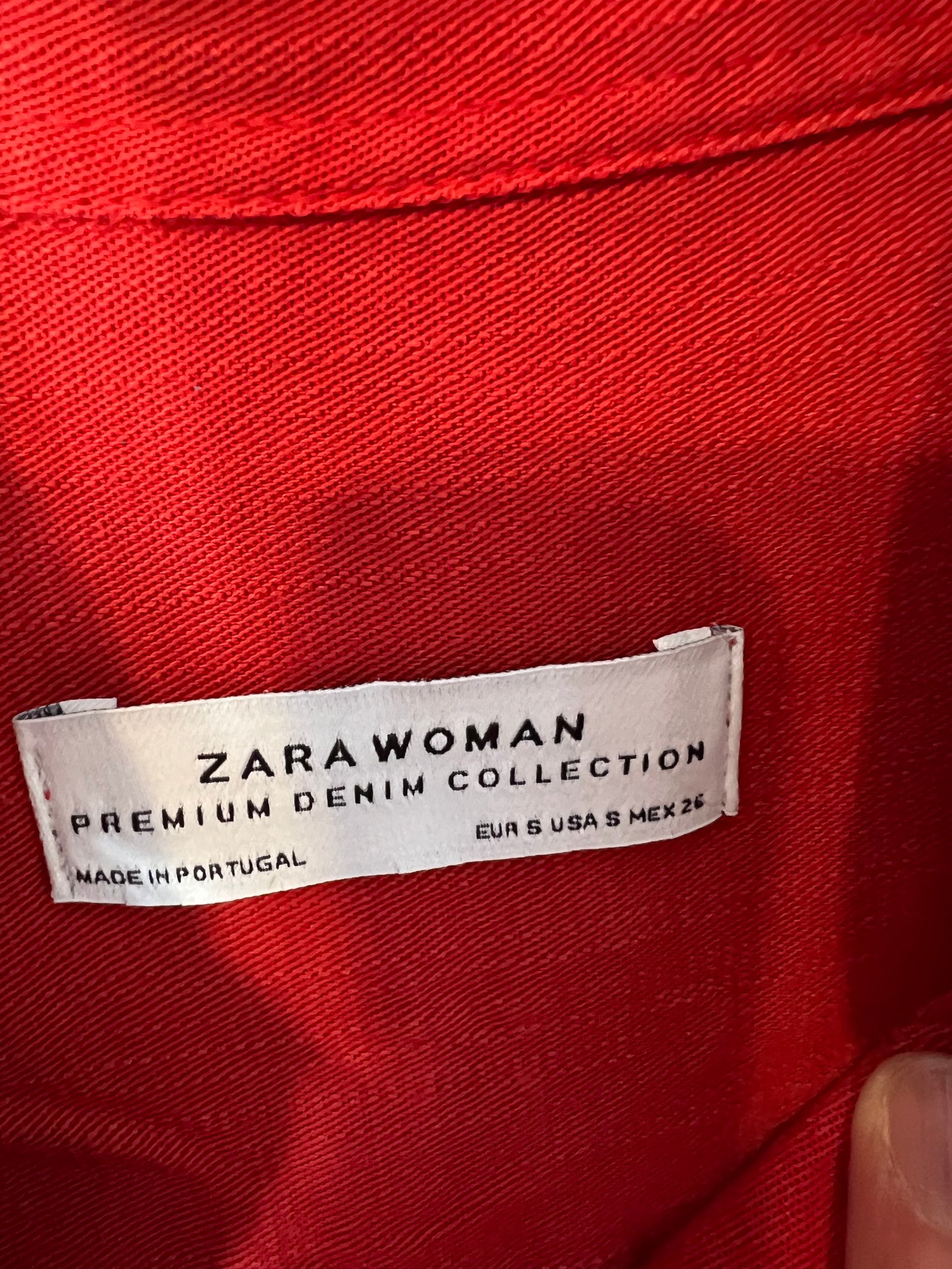 ZARA. Over a red shirt. TS