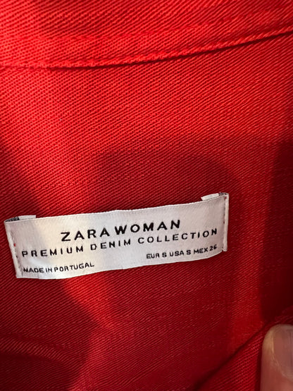 ZARA. Over a red shirt. TS