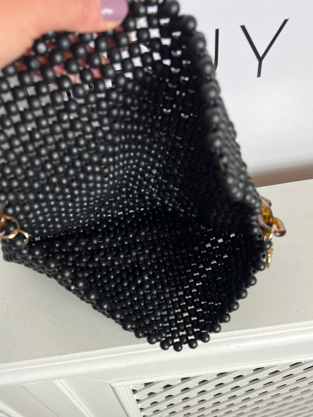 UTERQÜE. Bolso negro bolas