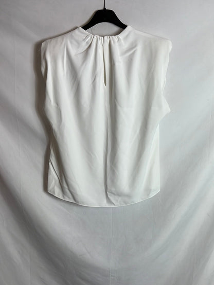 ZARA. Blusa blanca sin mangas hombreras. T S