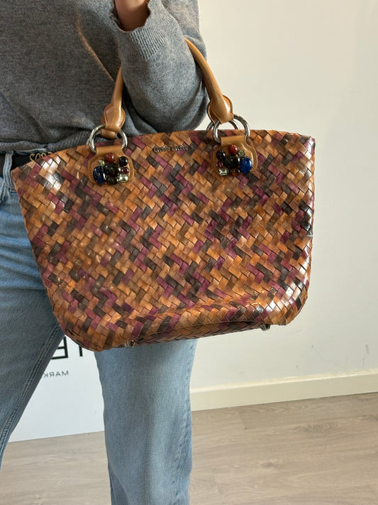 MIU MIU. Bolso trenzado piel