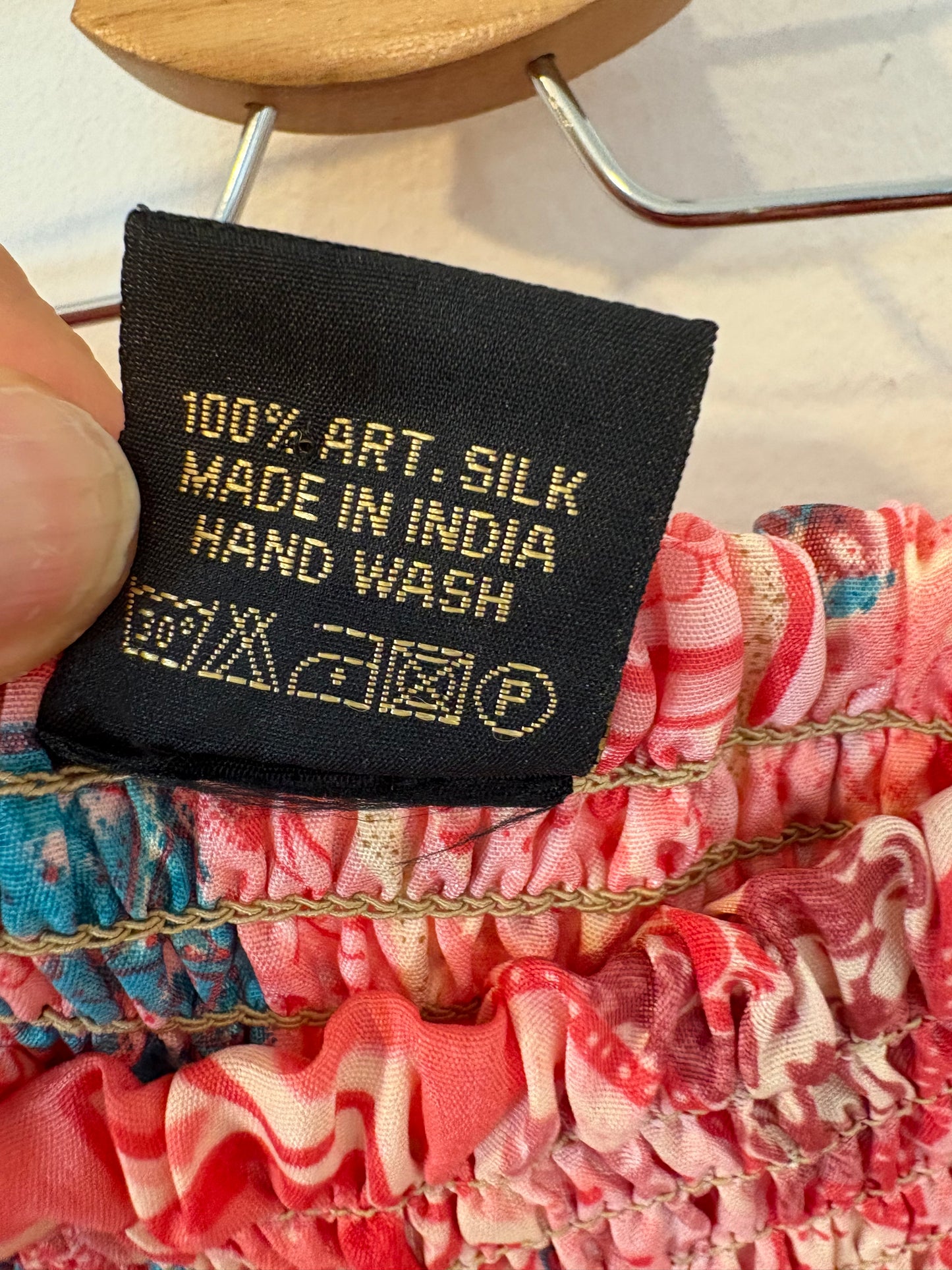 Pantalón seda efecto falda estampado