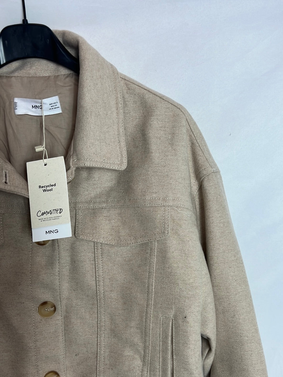 MANGO. Chaqueta beige jaspeada. T S