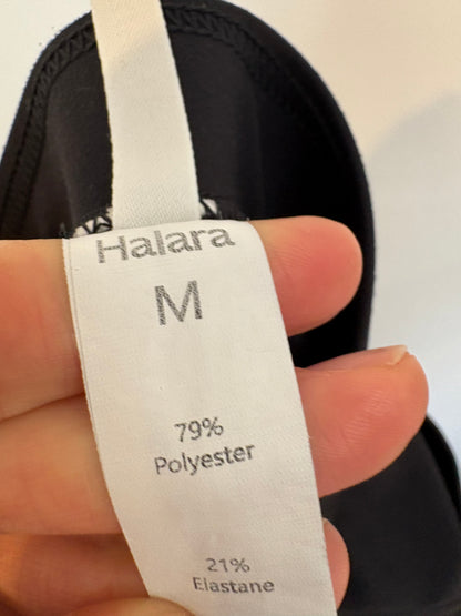 HALARA. Pantalón negro bolillos textura