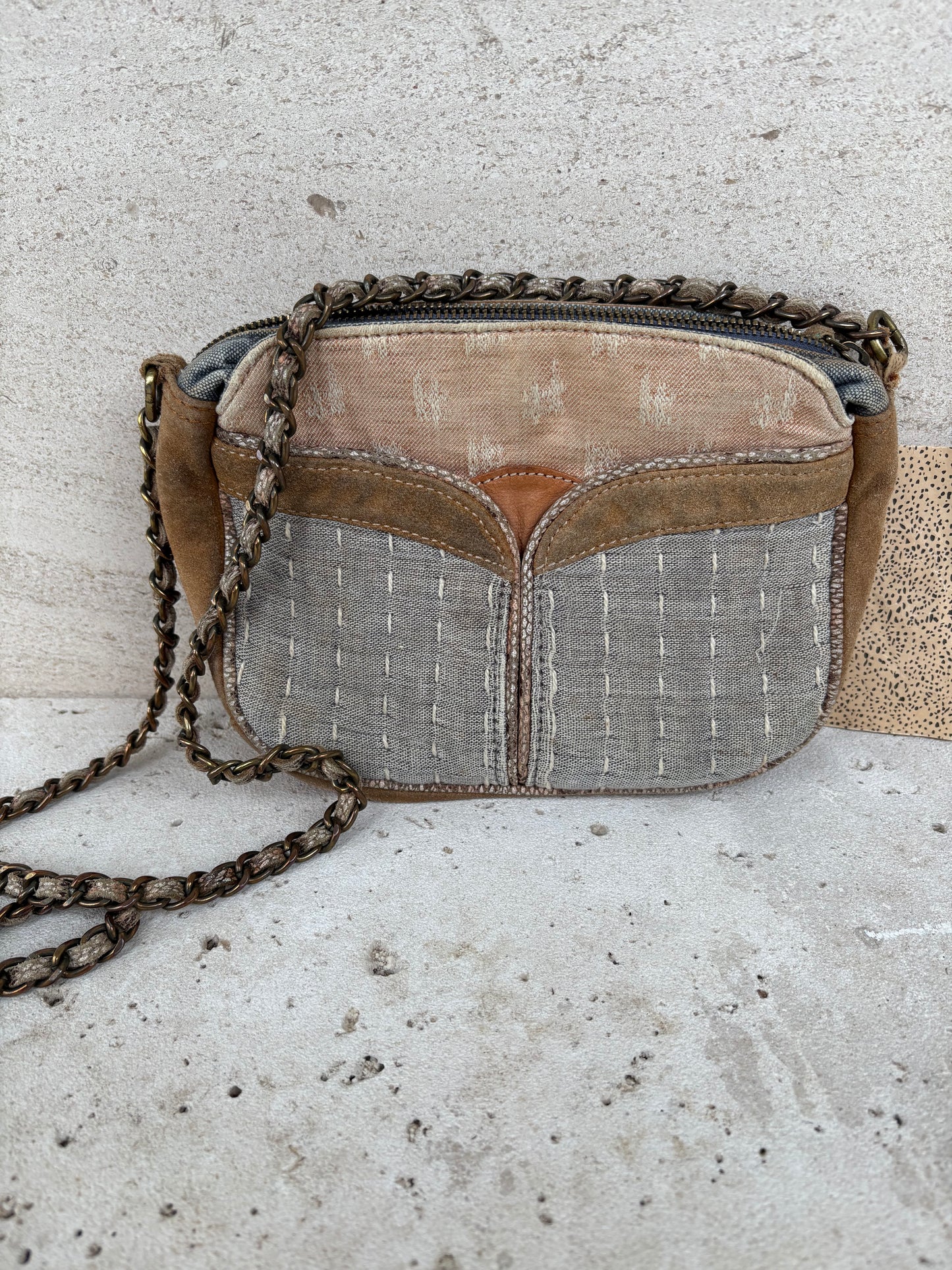 SESSÚN. Bolso bandolera tela y piel
