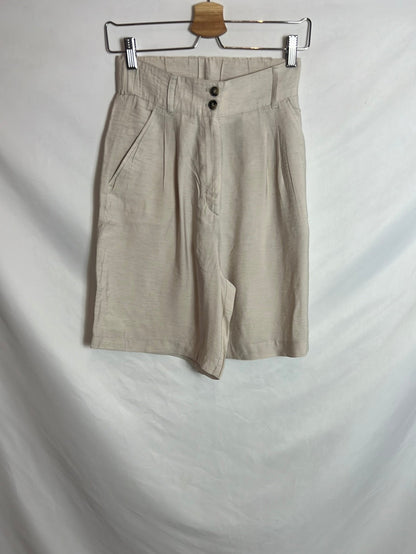 H&M . Bermuda larga beige jaspeada. T 38