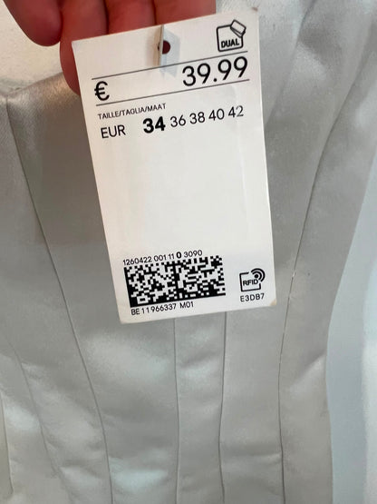 H&M  EDITION. vestido beige palabra de honor