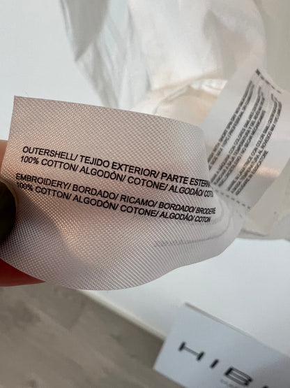 INTROPIA. White blouse with die-cut ruffles, size 38