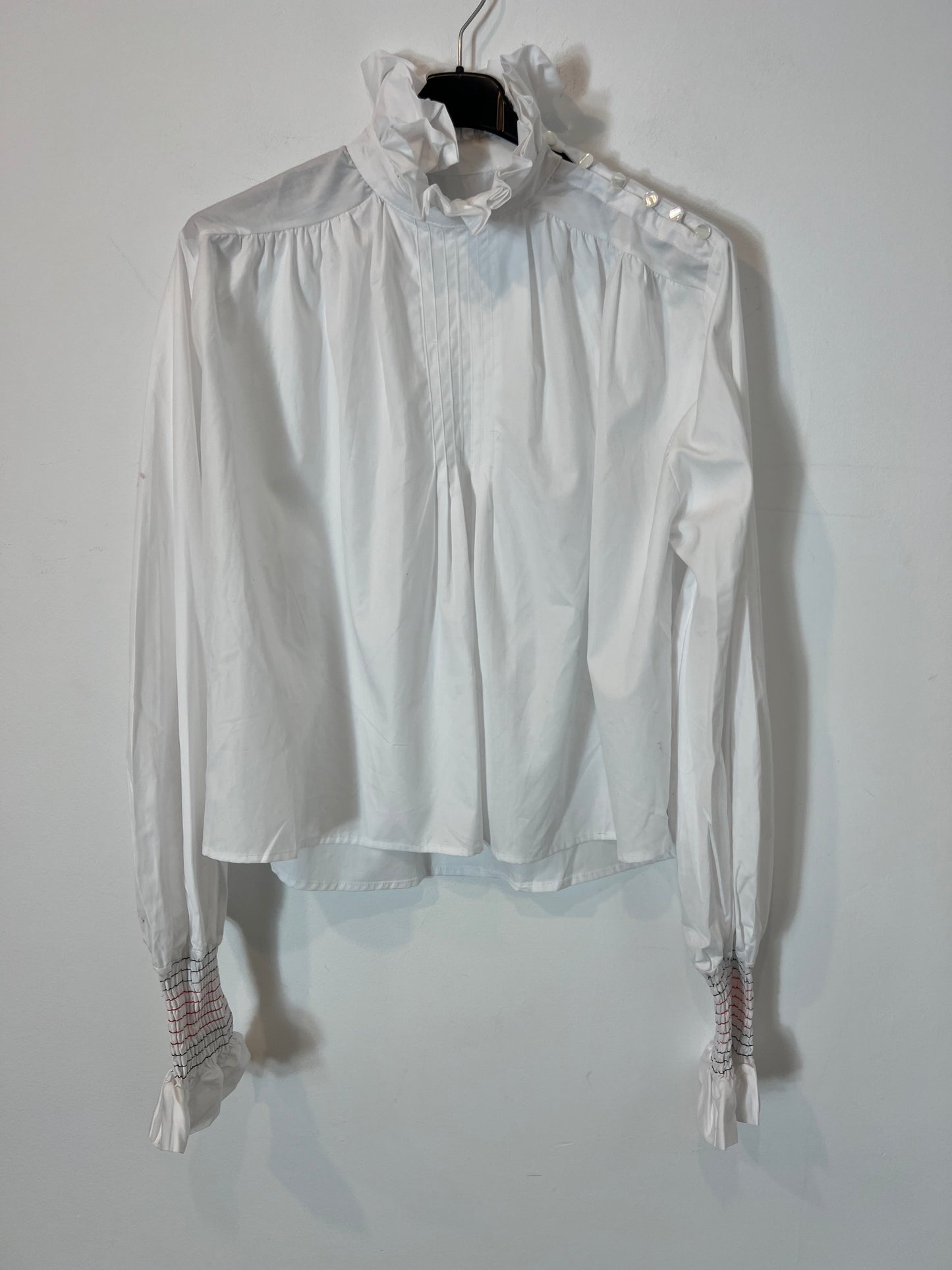 LAGANINI. Blusa blanca volante cuello T.s/m
