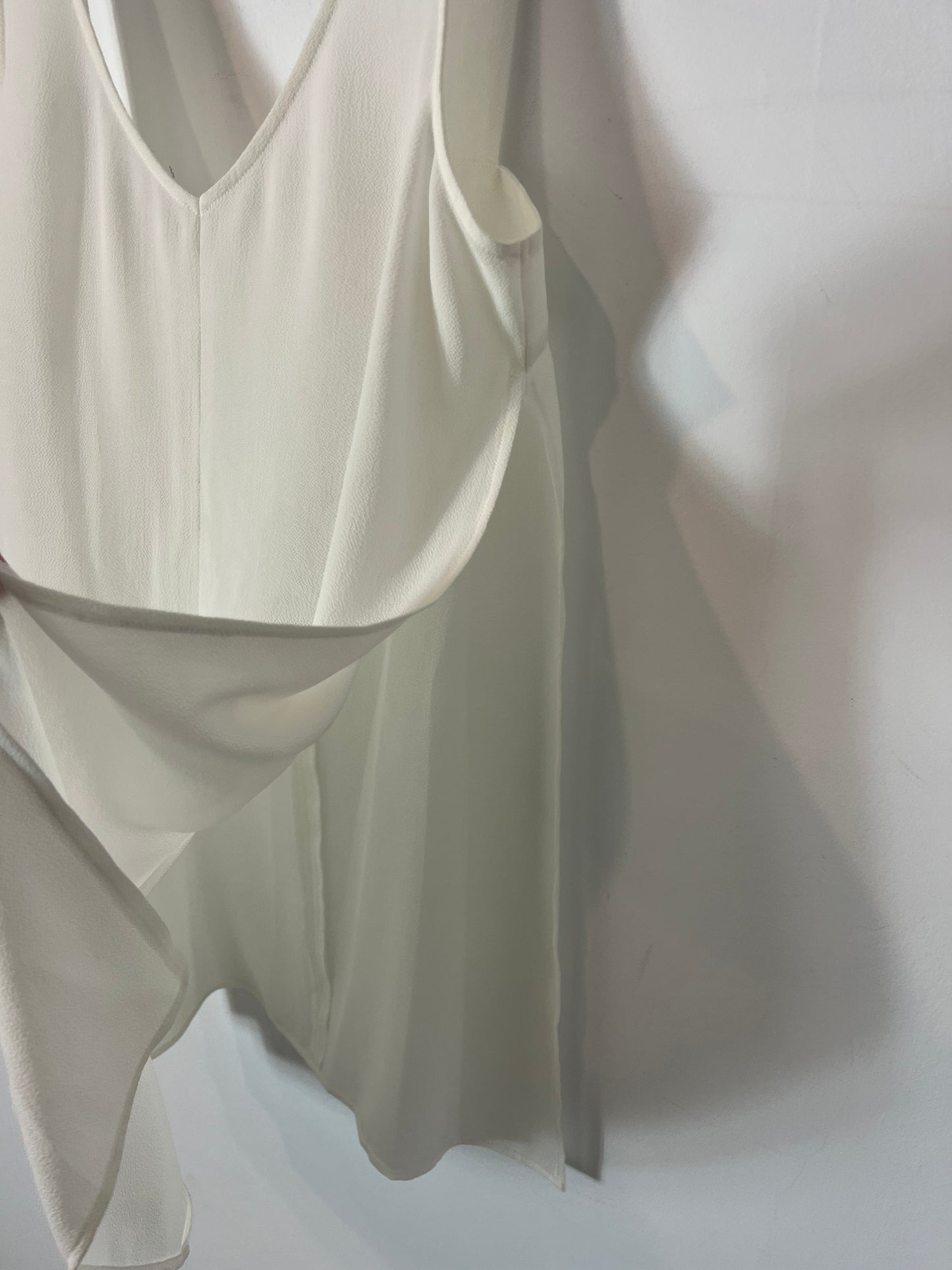 OTRAS. Top blanco fluido aberturas. T M/L