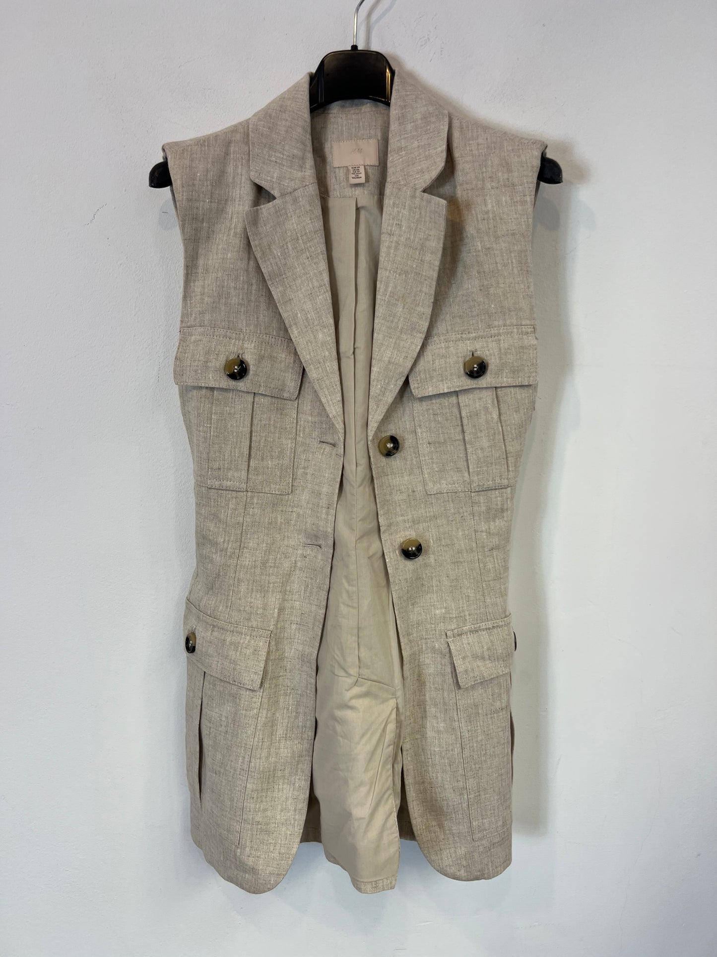 H&M. Chaleco lino bolsillos. T XS