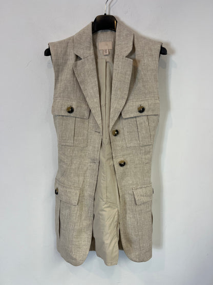H&M. Chaleco lino bolsillos. T XS