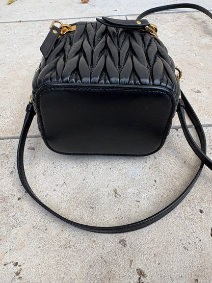 MIU MIU. Matelassé nappa leather micro bag