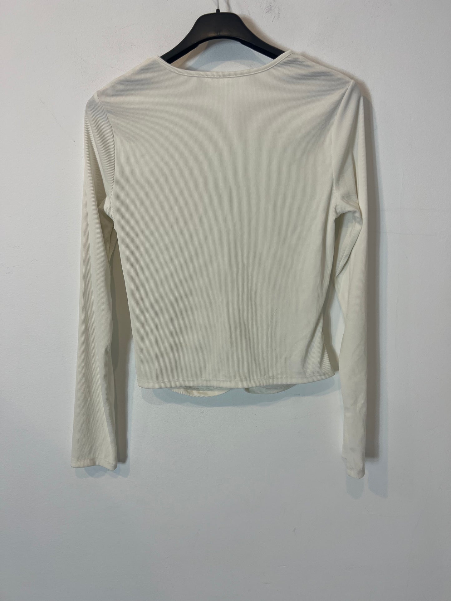 H&M. Top blanco canalé abertura. T M