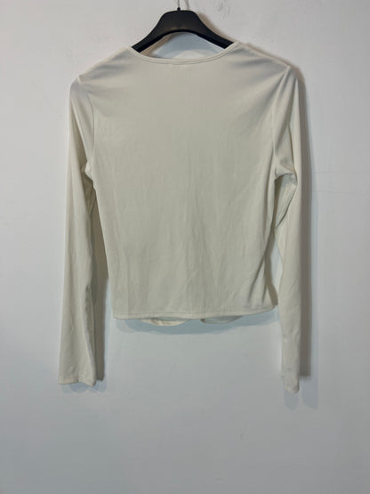 H&M. Top blanco canalé abertura. T M