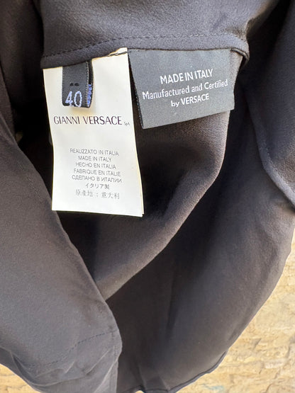 VERSACE. Top seda detalle hombros