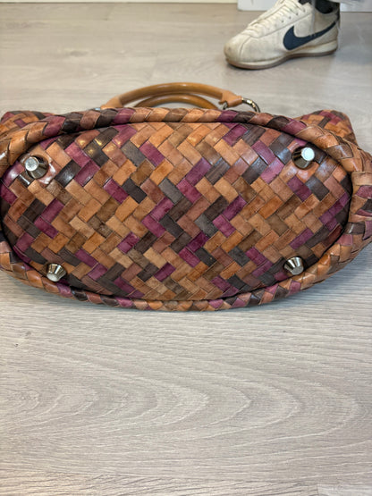 MIU MIU. Bolso trenzado piel