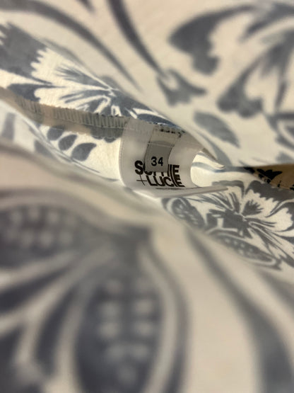 SOPHIE&LUCIE. Conjunto top y falda flores T.34