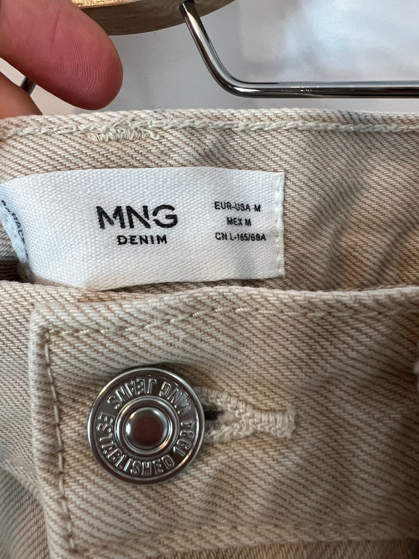 MANGO. Short beige buttoned denim skirt. TM