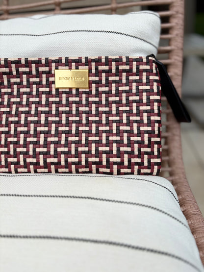 BIMBA Y LOLA. Cartera de mano trenzada