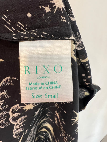 RIXO LONDON. Falda midi seda negra estampada T.s