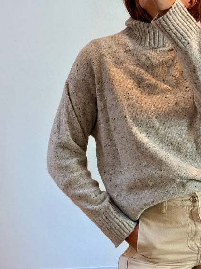 ZARA. Jersey gris cuello alto jaspeado