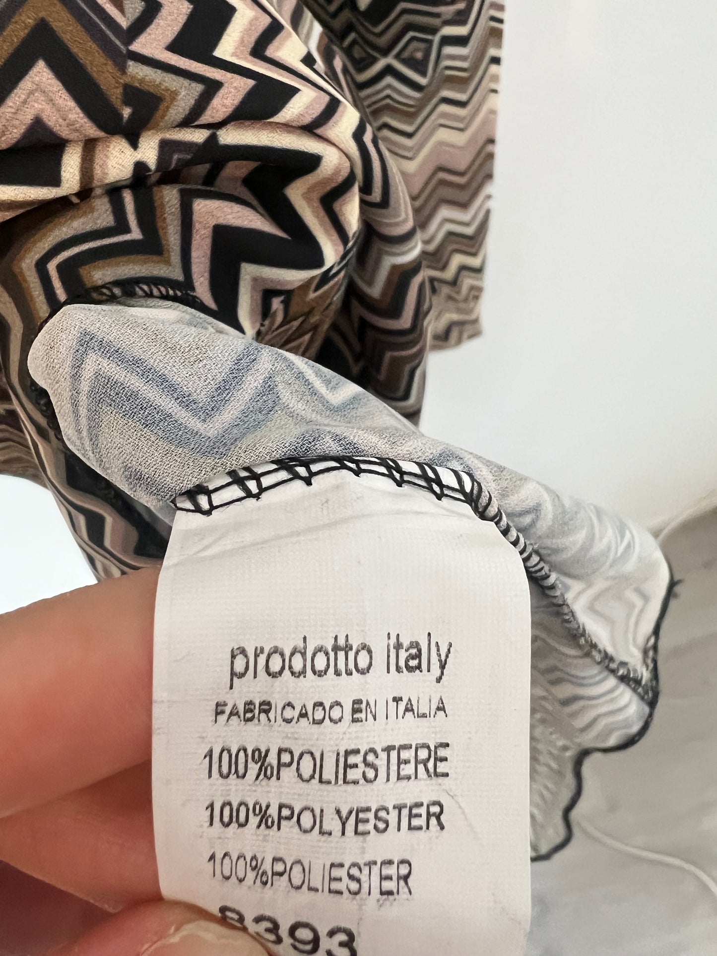 NEW. Flowy brown print blouse. TM/L