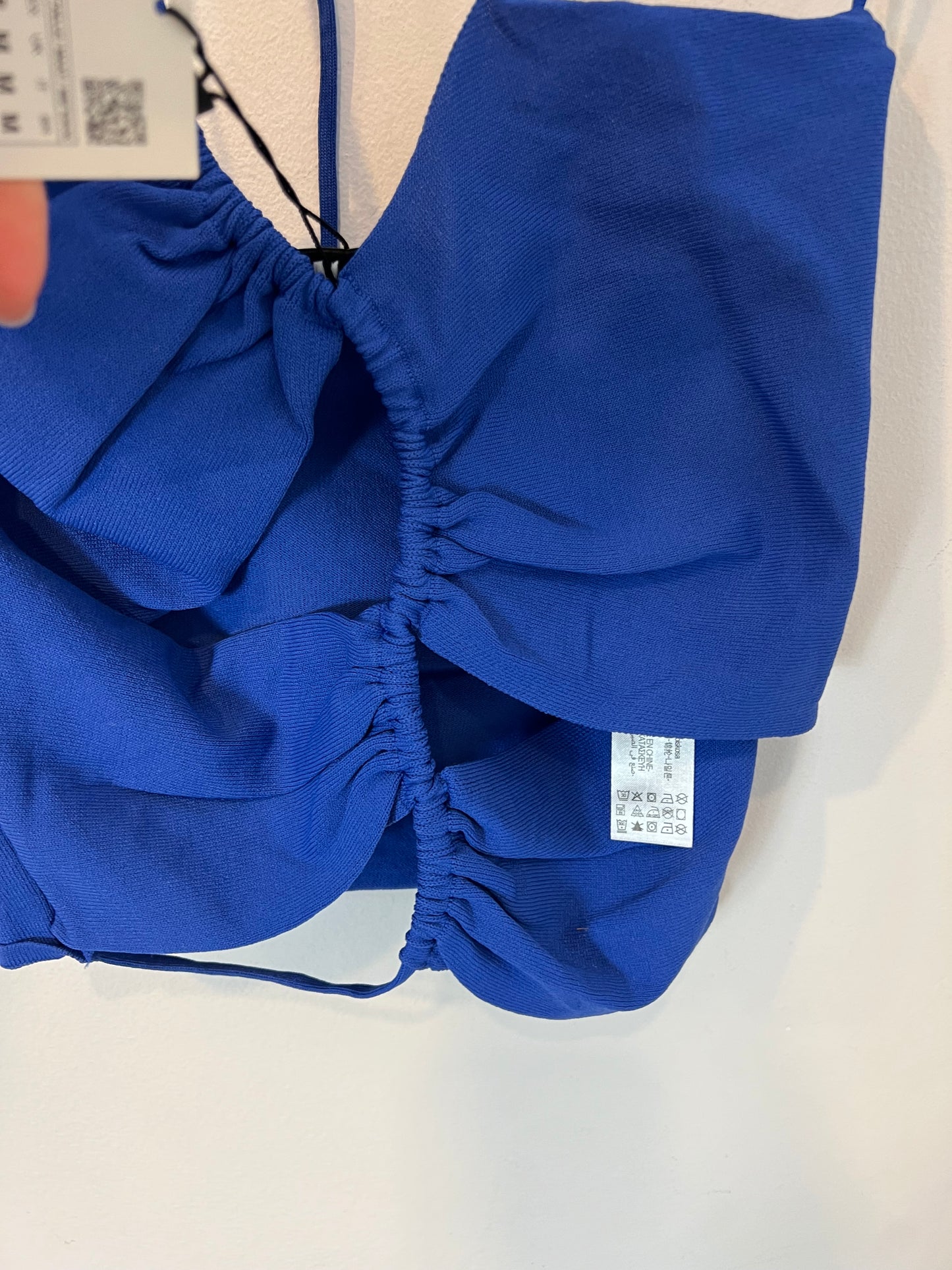 ZARA. Elastic blue top with openings. TM