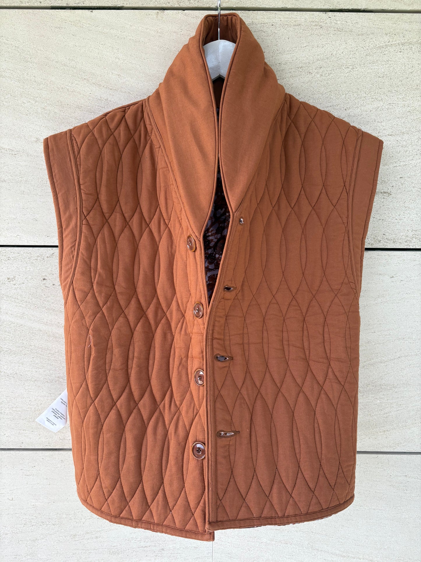 SESSÚN. Chaleco acolchado reversible