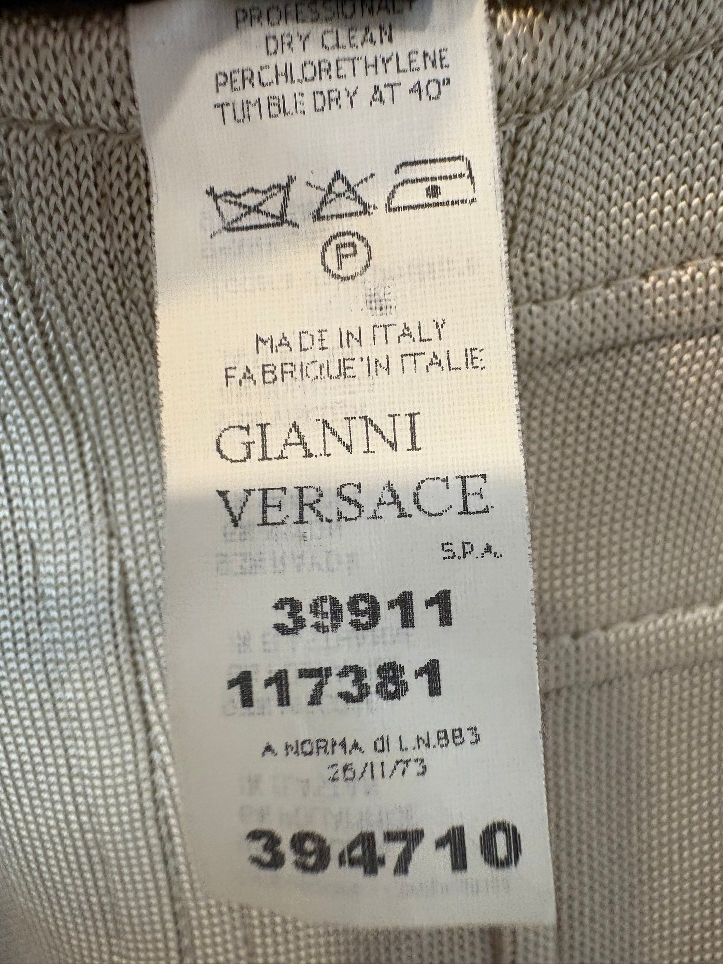 VERSACE. Falda elástica volante