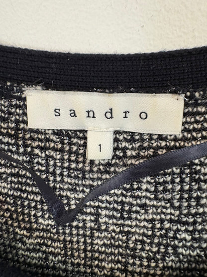 SANDRO. Top punto negro estampado lana