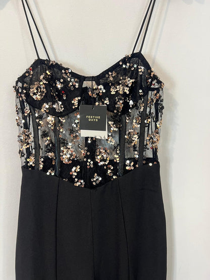 ZARA. Mono negro lentejuelas