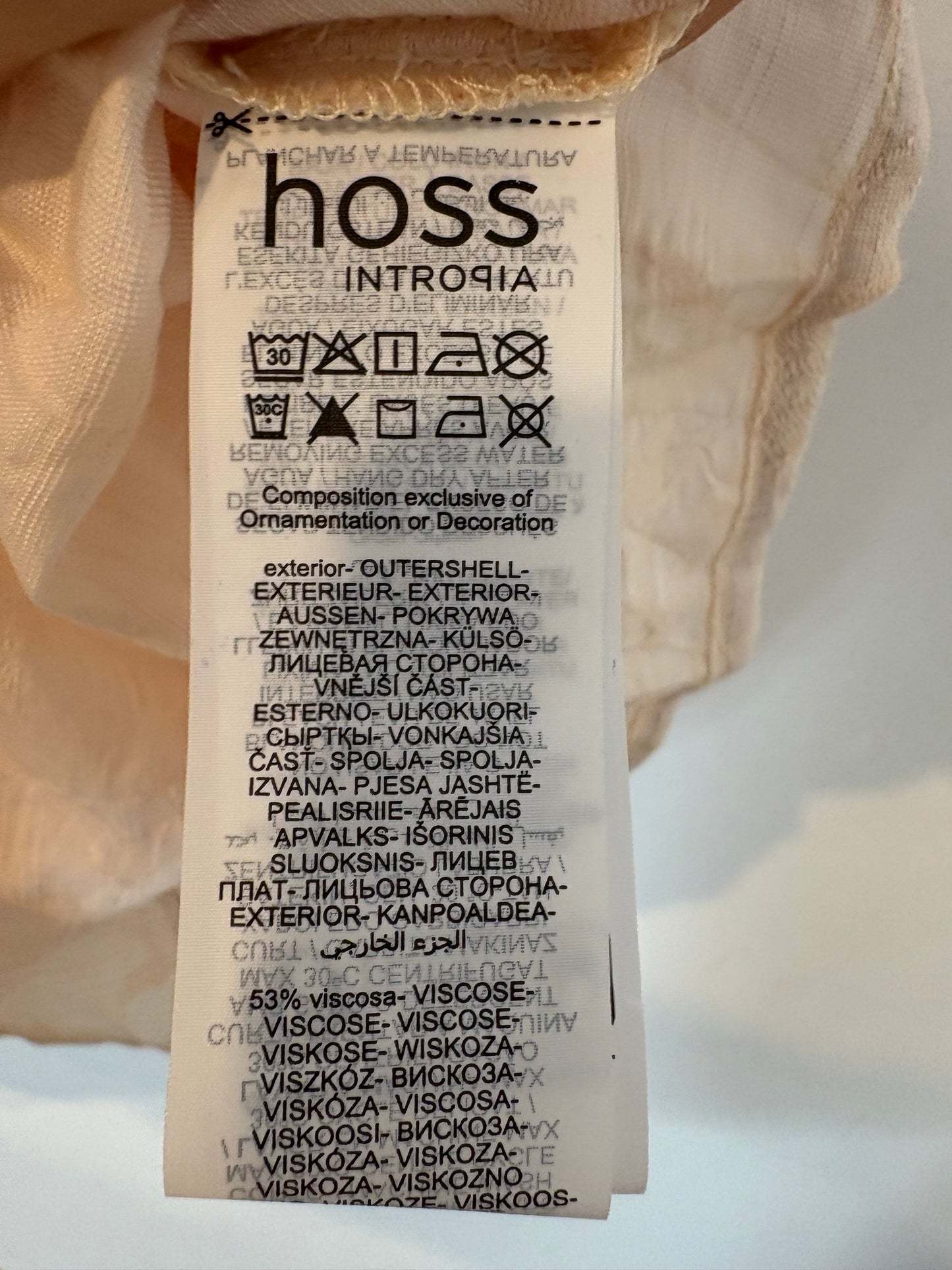 INTROPY. Light pink blouse texture. TM