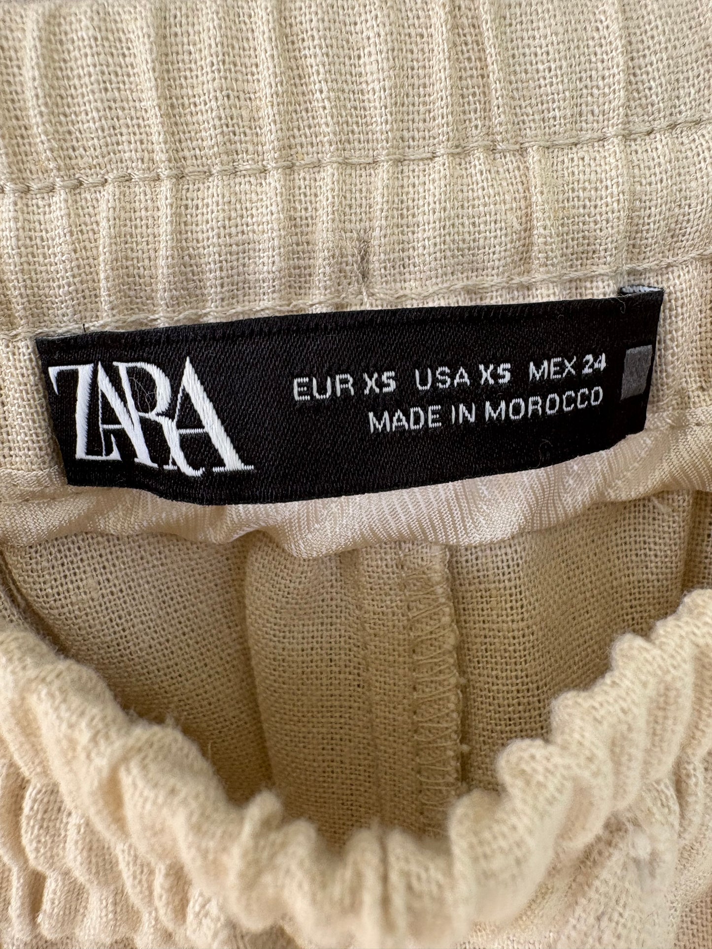 ZARA. Pantalón fluido mezcla