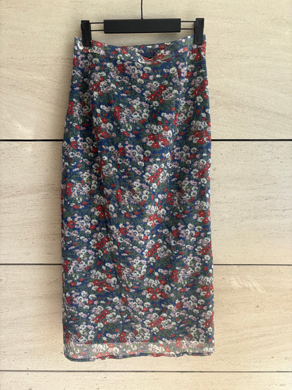 MASSCOB. Falda midi estampada volante mezcla