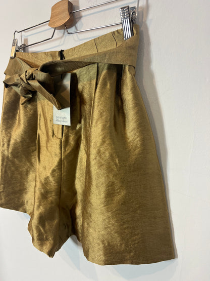 ZARA. Pantalón fluido dorado T.m