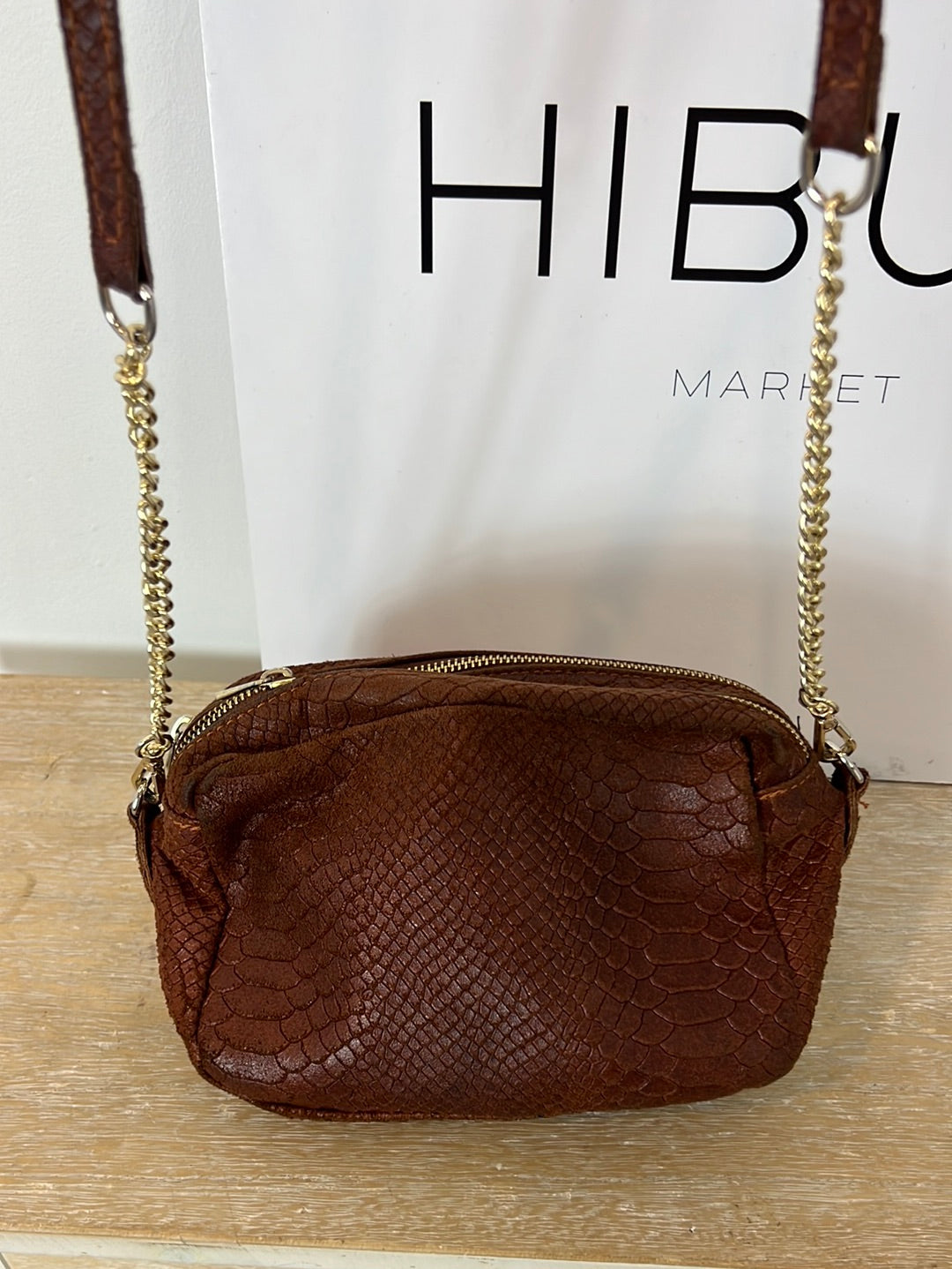 OTHER. Textured leather bag with long handle