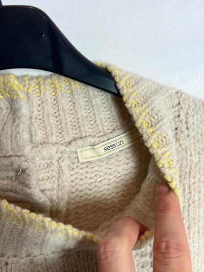 SESSUN. Sleeveless two-tone wool sweater. T.S.