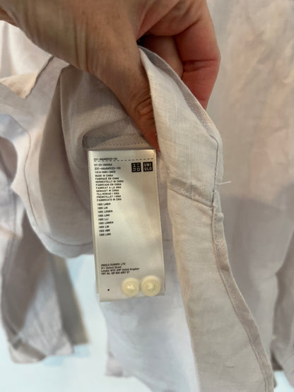 UNIQLO.Camisa malva lino. T.xs