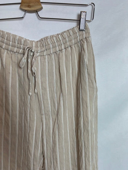 ZARA. Textured beige trousers. TS