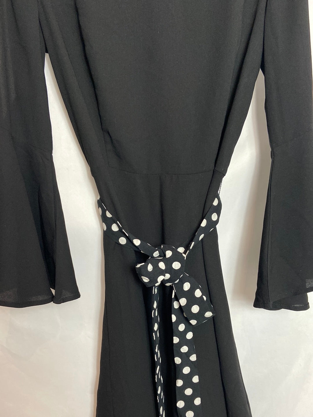 WHITE. Black dress with polka dot belt TS