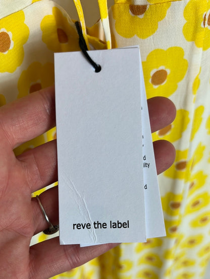 REVE. Floral midi dress with neckline detail. TS