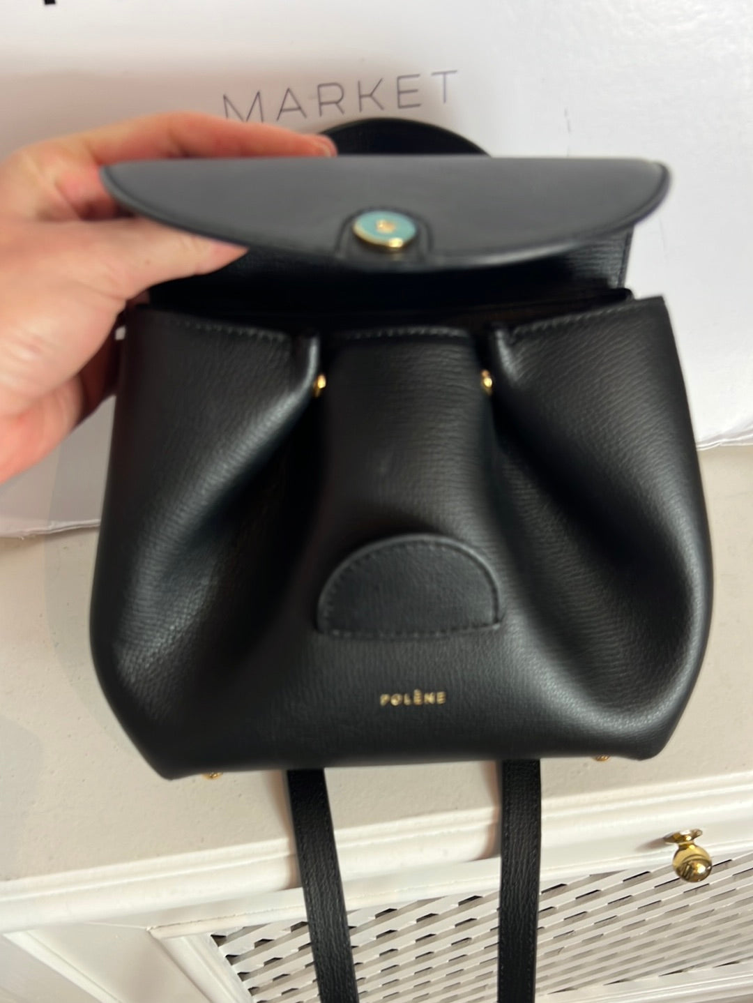 POLLENE. Black mini bag with long handle