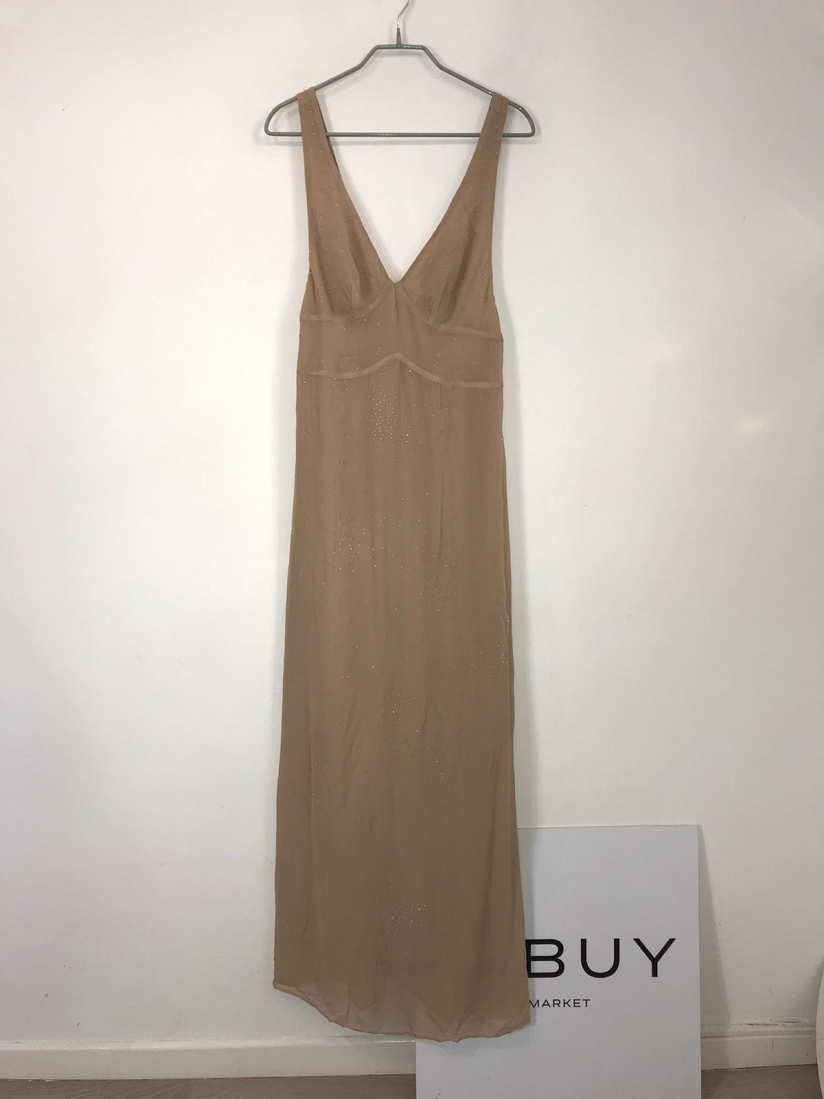 ZARA. Vestido largo vaporoso espalda baja
