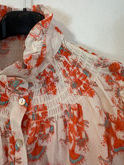 OTRAS. Blusa estampada nido de abeja