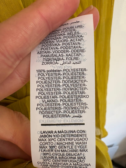 CORTEFIEL. Blusa pistacho plisada