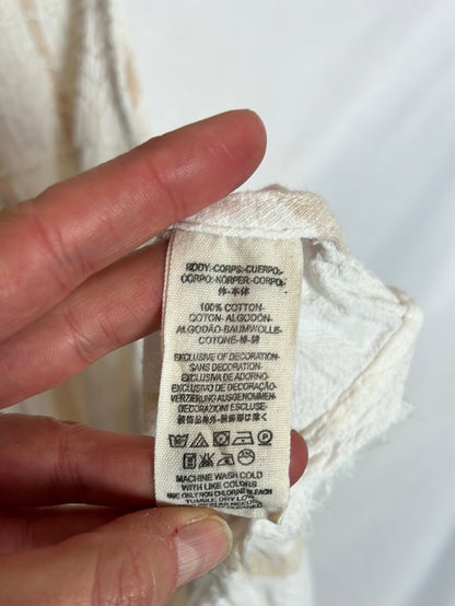 FREE PEOPLE. Top largo aperturas. T S