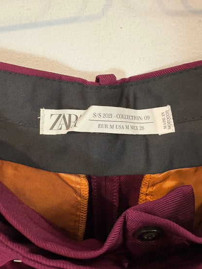 ZARA. Pantalón fluido burgundy pinzas