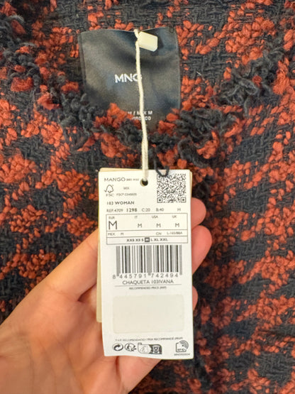 MANGO. Chaqueta tweed detalle botones
