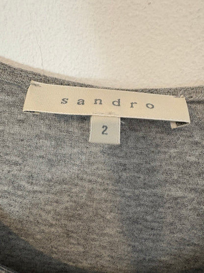 SANDRO. Vestido doble textura detalle joya